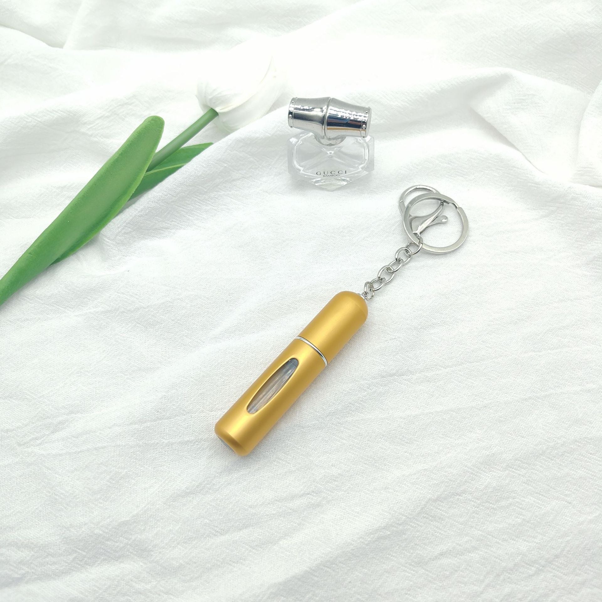 Wholesale bottom filling pump 5ml high color value sample key chain perfume bottle